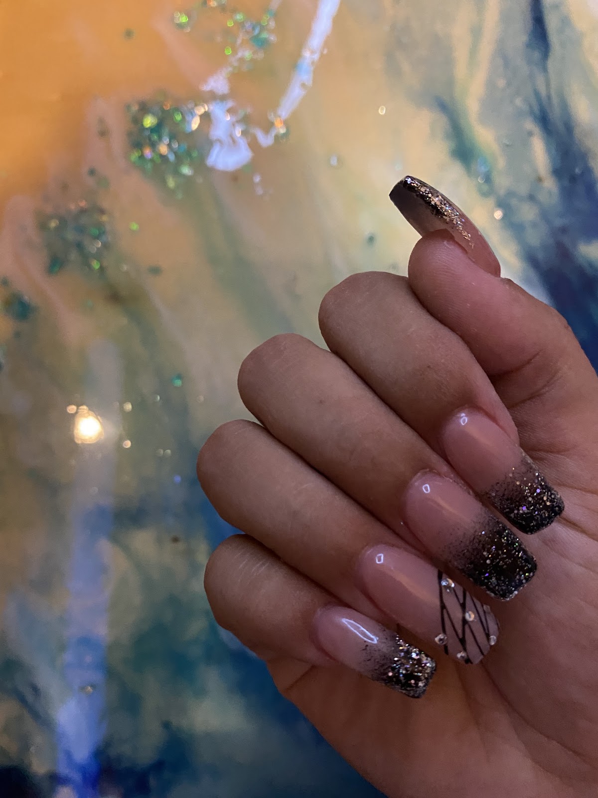 Ombre black glitter almond nails