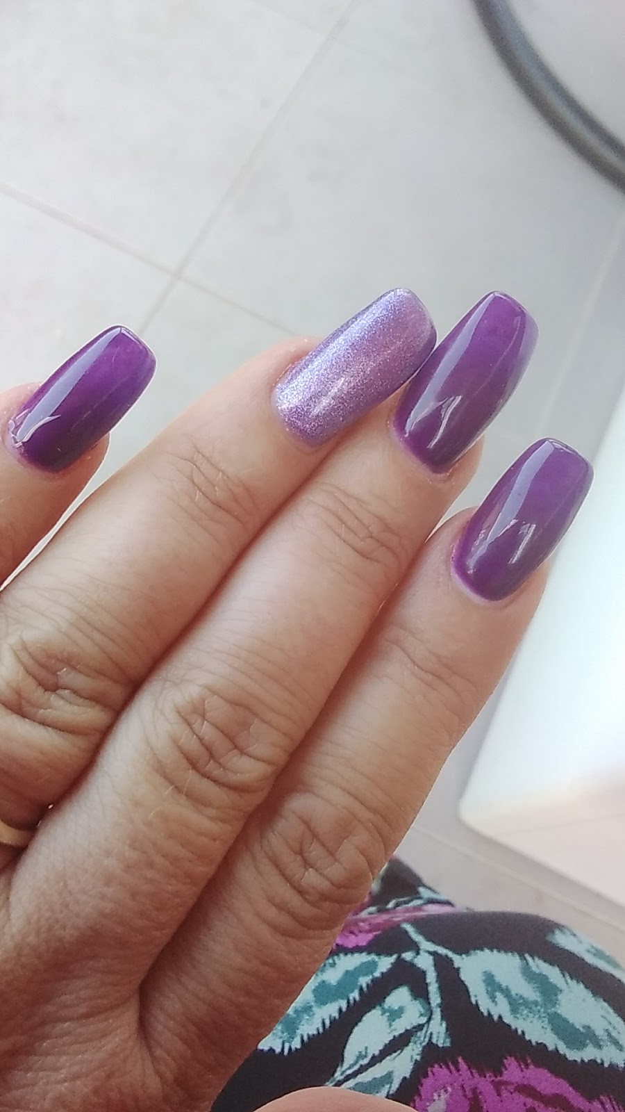 Glossy purple and lilac chrome nails