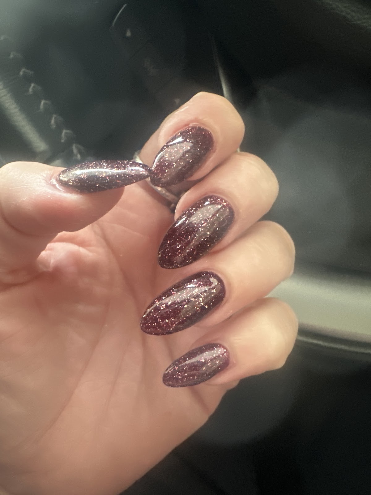 Dark plum glitter almond nails
